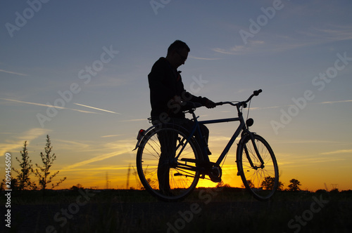 Man starting drive on bicycle