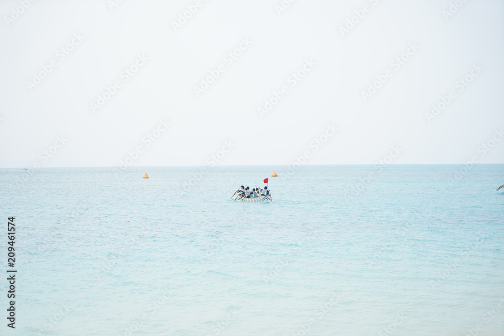 traditional boat and white beach in Okinawa Japan, morning relaxing