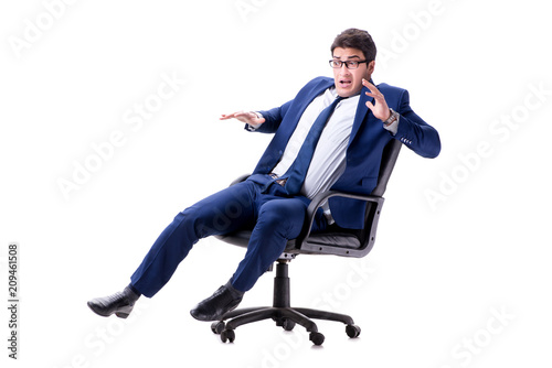 Businessman sitting on office chair isolated on white photo