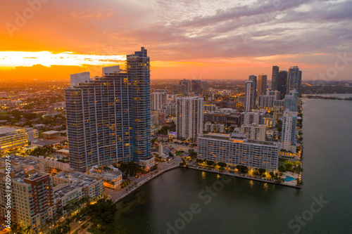 Waterfront city with sunset photo