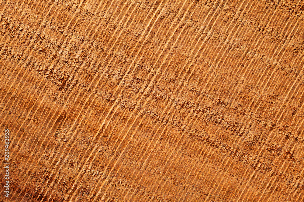 Wooden texture with traces of the saw for background. Wooden texture with traces of the saw for background.