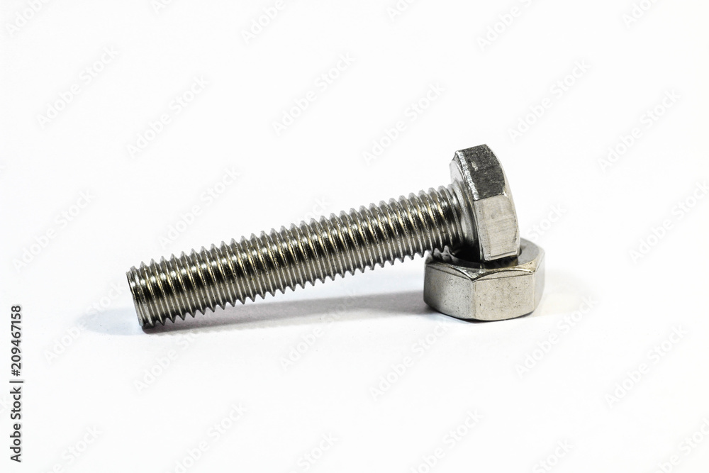 Metal bolt and nut isolated on white background Metal bolt and nut isolated on white background