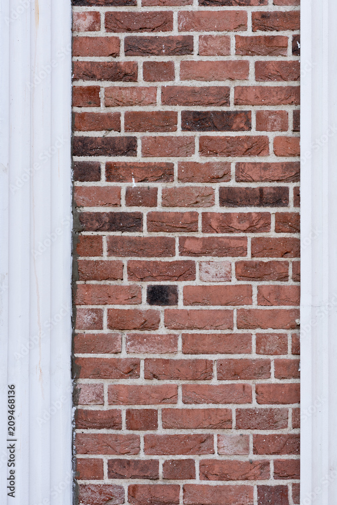 Fototapeta premium Red brick wall texture with molding