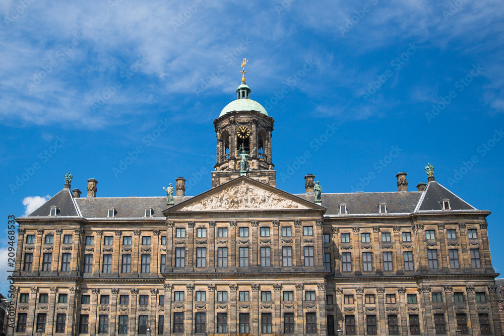 Obraz premium The facade and dome of the 17th century Royal Palace of Amsterdam, otherwise known as the Dam Palace, in Amsterdam, Netherlands.
