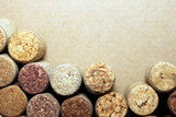 Close up of wine corks on brown paper background