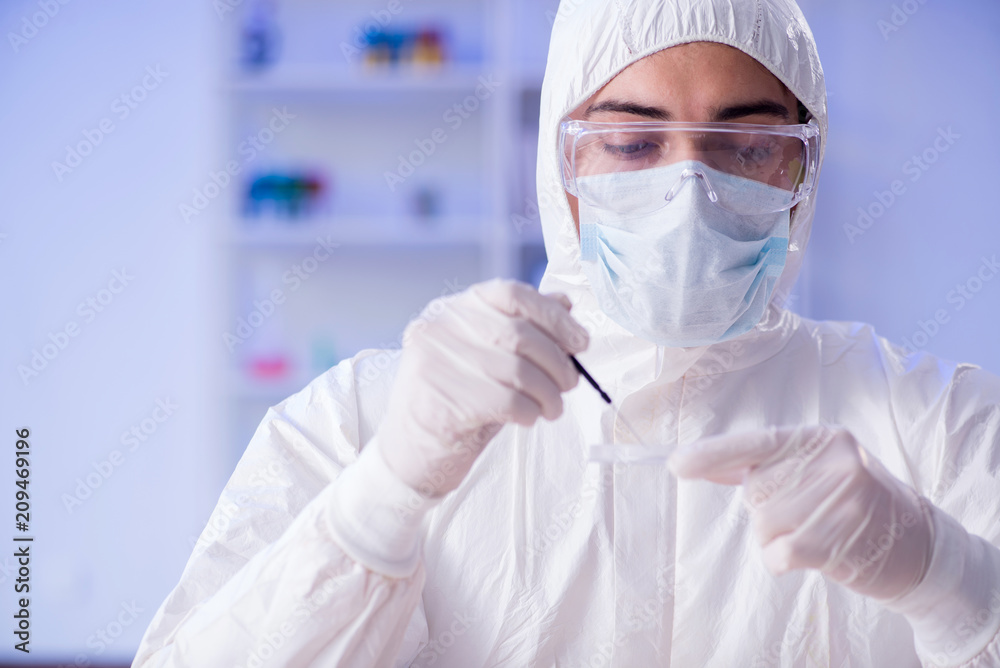 Lab assistant testing blood samples in hospital Lab assistant testing blood samples in hospital