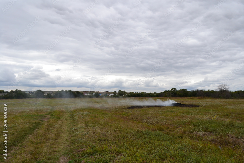 landscape and smoke on field