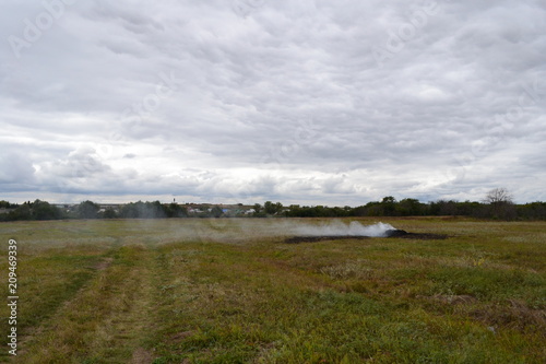 landscape and smoke on field