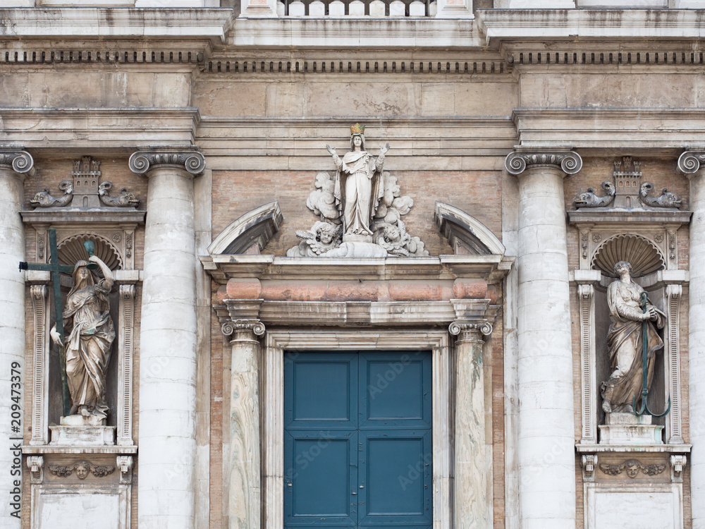 Detail of the Baroque style facade of the Basilica of Santa Maria in Porto, Ravenna, Italy.