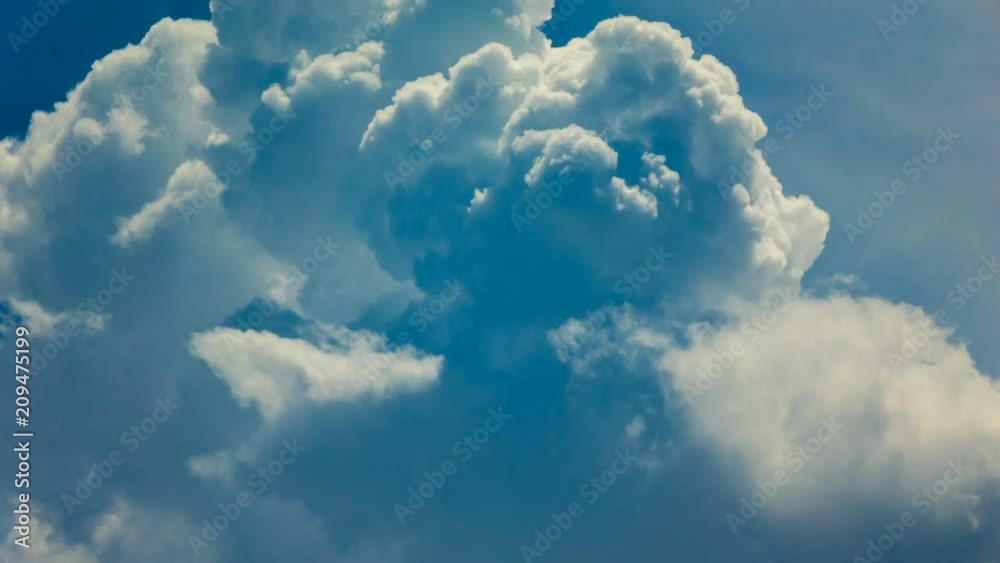 Clouds moving on blue sky, time lapse Clouds moving on blue sky, time lapse