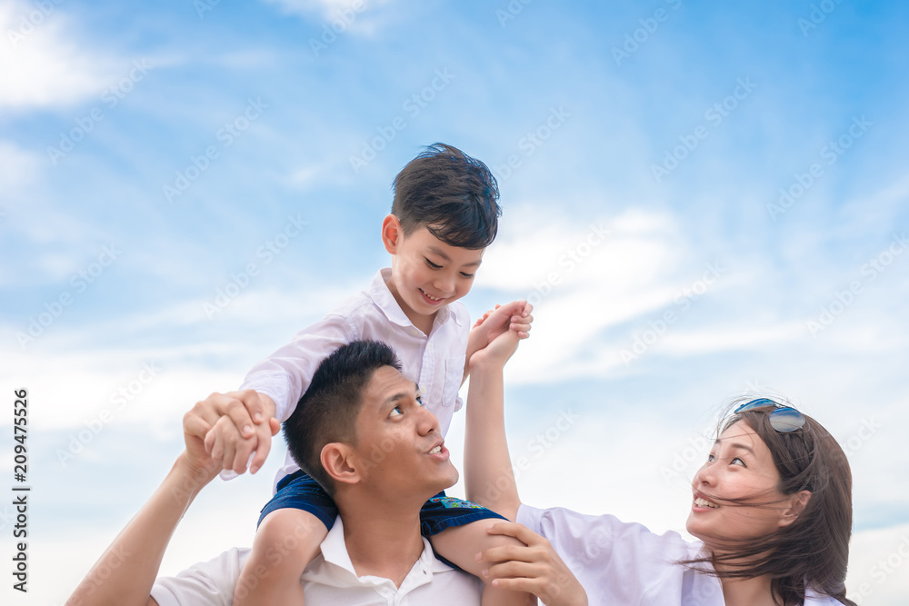 portrait happy family mom dad and son playing together portrait happy family mom dad and son playing together