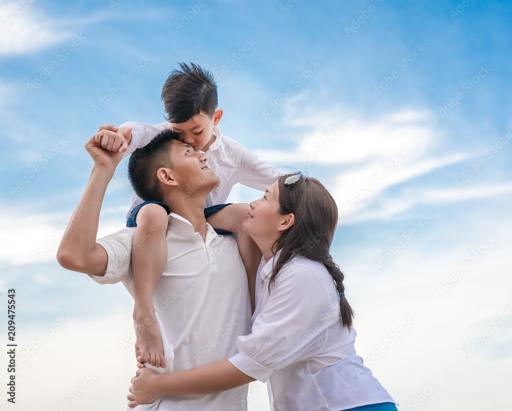 portrait happy family mom dad and son playing together portrait happy family mom dad and son playing together