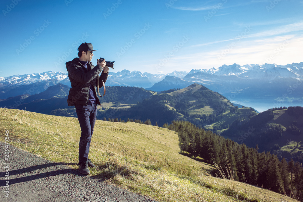 A man photograph mountain view, Travel concept.