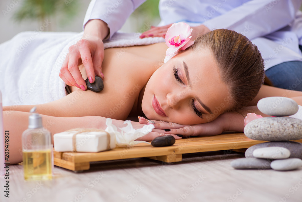 Young woman during spa procedure in salon