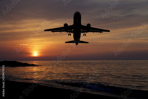 sunset sea and airplane