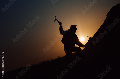alpinist at sunset