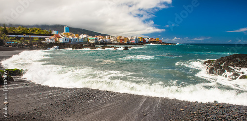 View of colourful houses of Punta Brava from beach Jardin in Puerto de la Cruz, Tenerife, Canary Islands, Spain photo