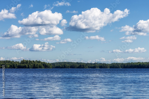 Landscape of beautiful lake with forest and clouds