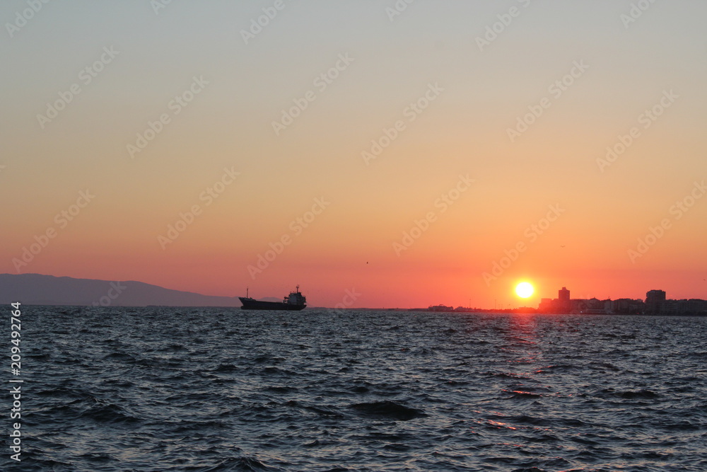 Turkey Aegean Sea: view from the city embankment of the cordon at sunset