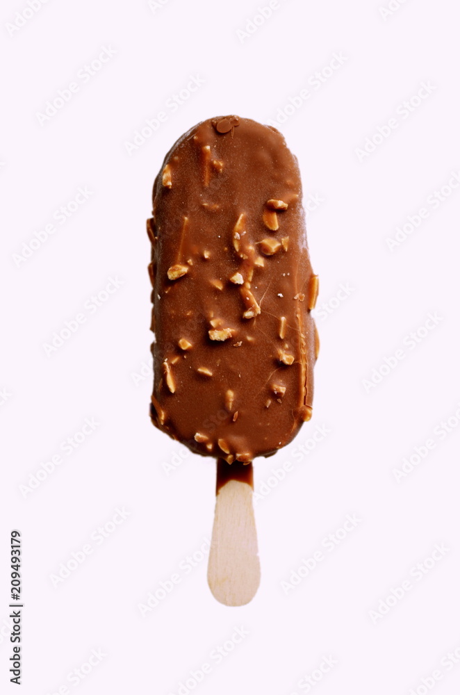 Chocolate ice lolly with almonds on the white isolated background. Ice cream bar,summer hot day. Cold yummy ice cream .Ice cream design. Chocolate ice lolly with almonds on the white isolated background. Ice cream bar,summer hot day. Cold yummy ice cream .Ice cream design.