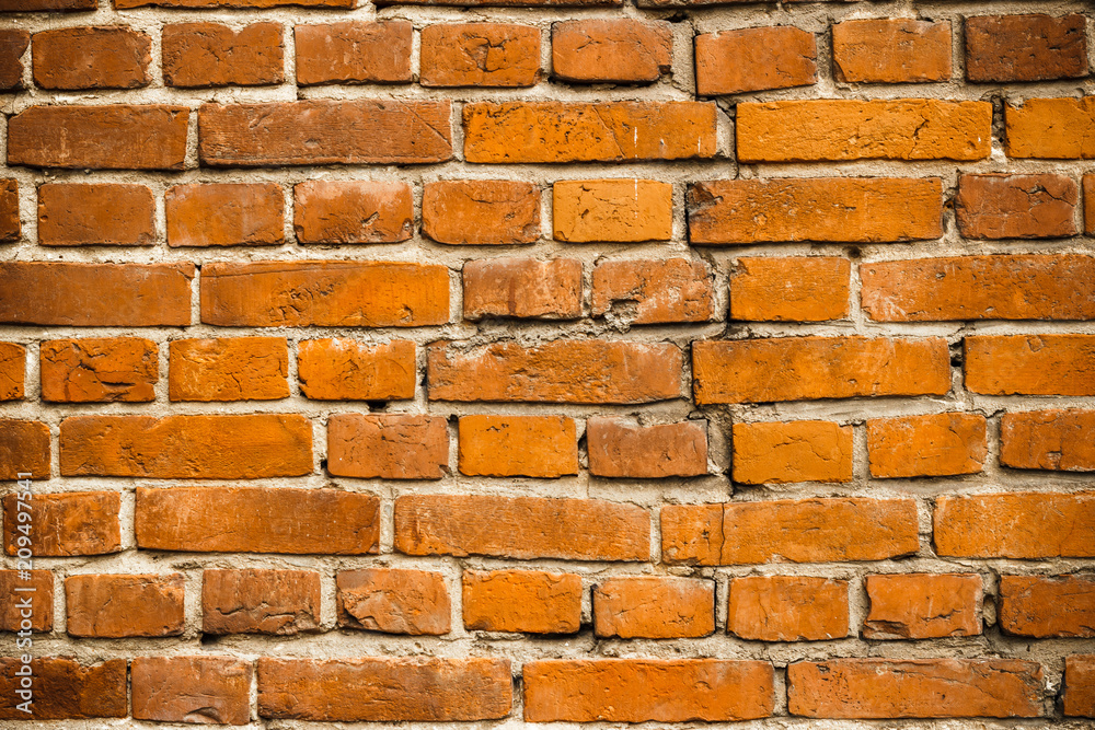 Obraz premium Texture of a old red brick wall background