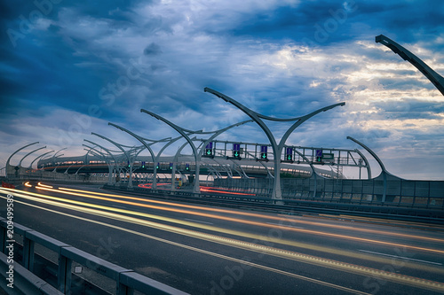 Highway at night with car t...