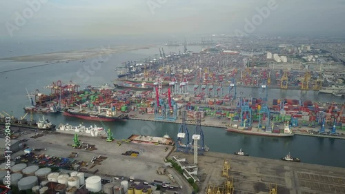 Establishing drone shot of Tanjung Priok container terminal in Jakarta, Indonesia economy photo