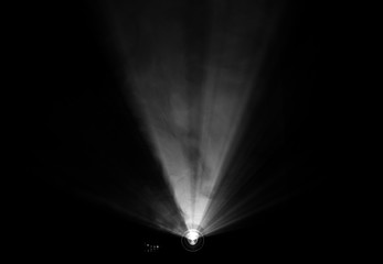 projector beautiful lighting . wide lens equipment for show presentation at night . smoke abstract background .