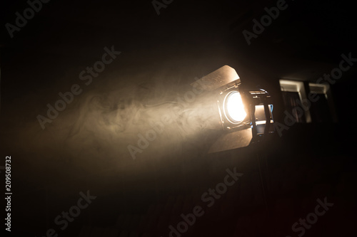 Studio spotlight using for background production film . silhouette blur Studio led lighting . vintage production for movie smoke in dark room . electric equipment for photography , video maker tte obj