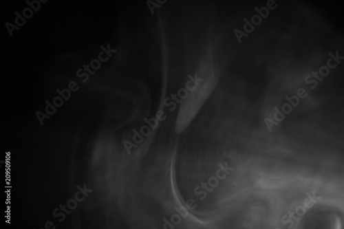 smoke texture or pattern in the air , bright light effect realistic at dark background .