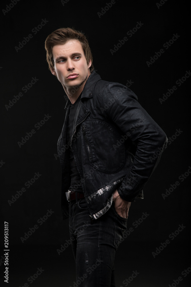 Charming brunet in jeanswear shot in the dark Charming brunet in jeanswear shot in the dark