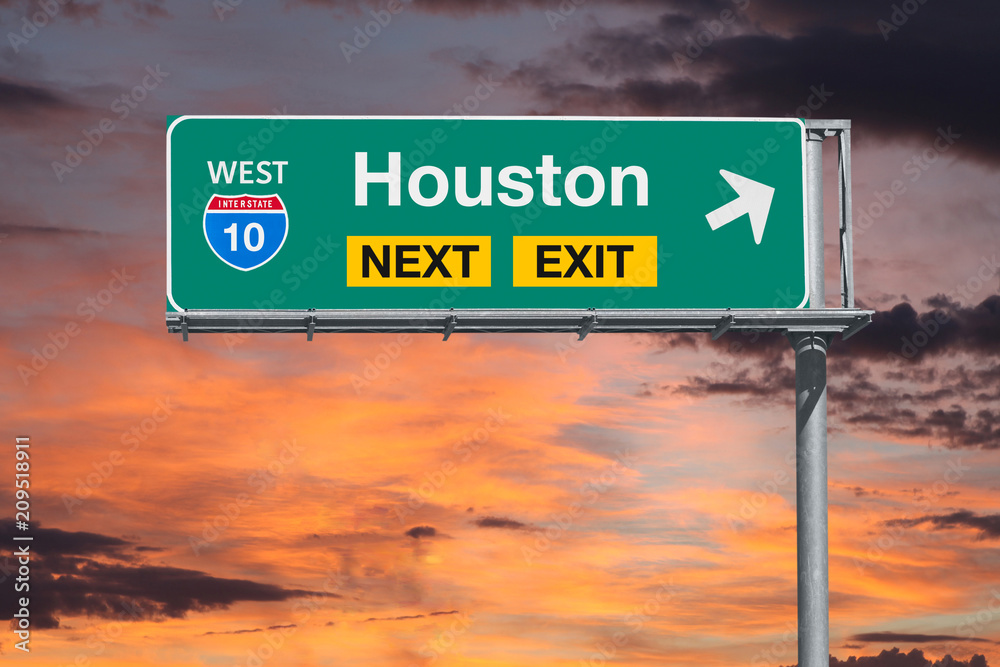 Houston Texas Route 10 Freeway Next Exit Sign with Sunset Sky Stock
