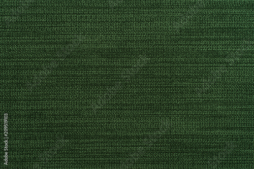 Green fabric texture background.