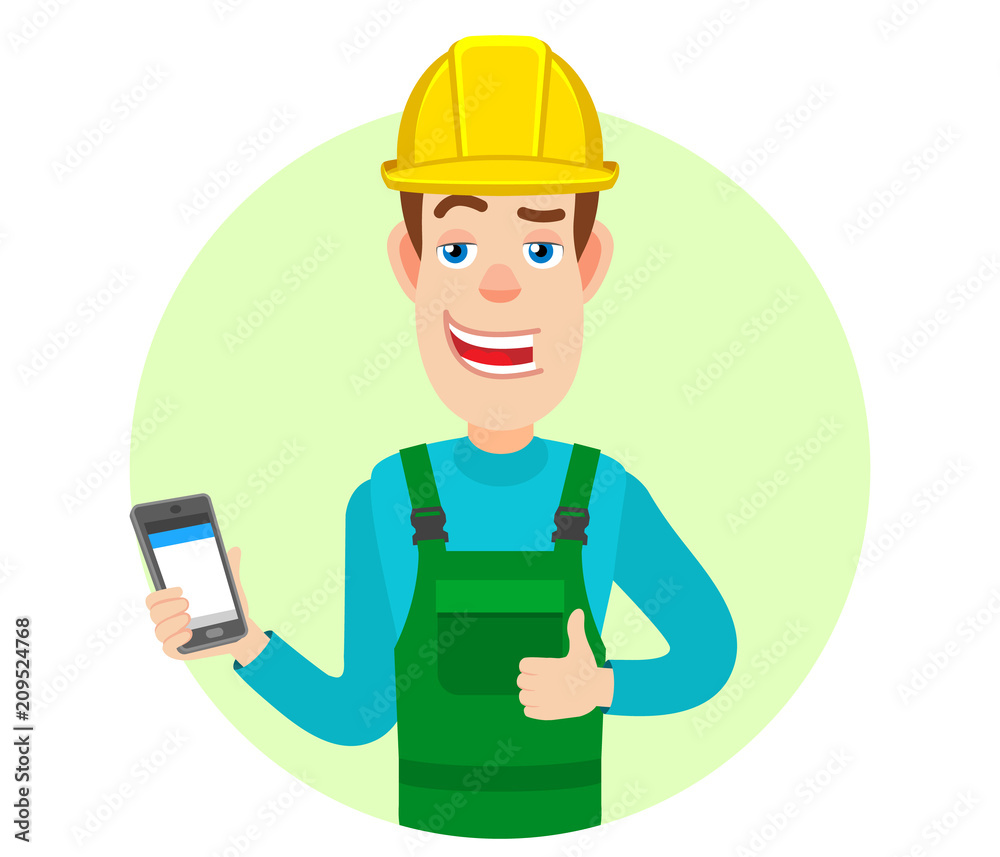Builder holding mobile phone and showing thumb up Builder holding mobile phone and showing thumb up