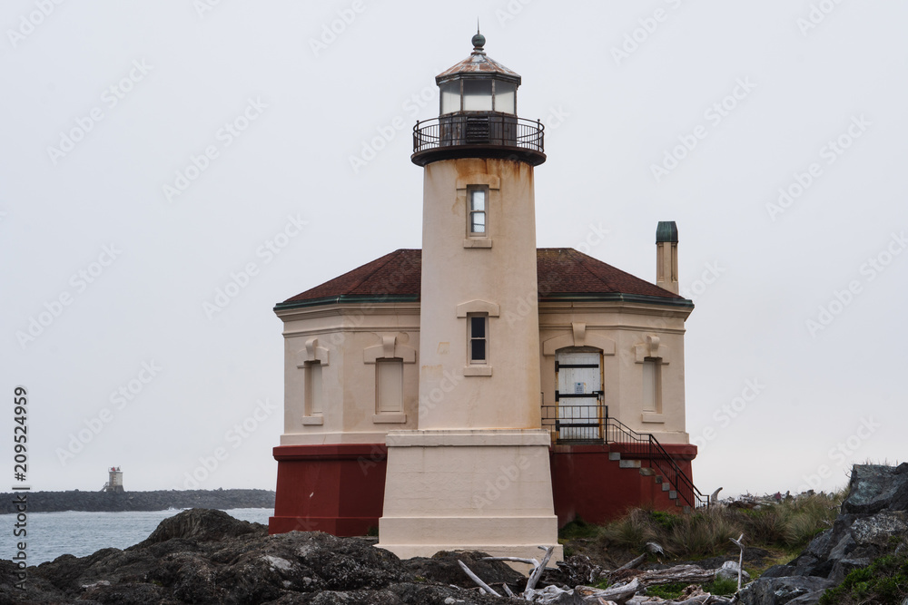 Coquille River Lighthouse on a foggy late afternoon in Bandon on the Oregon Coast