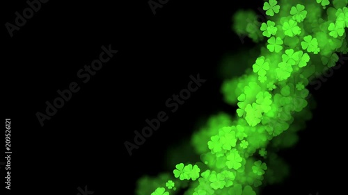 Abstract bokeh light sparkles clover four leaf pattern green color illustration on dark background, seamless looping animation 4K with left copy space