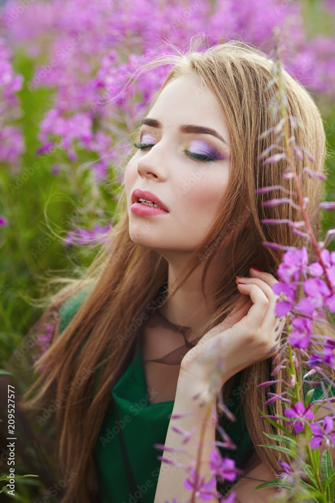 attractive girl in a field with flowers attractive girl in a field with flowers