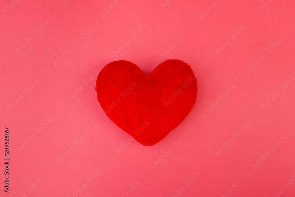 Red heart on color background. minimal concept.