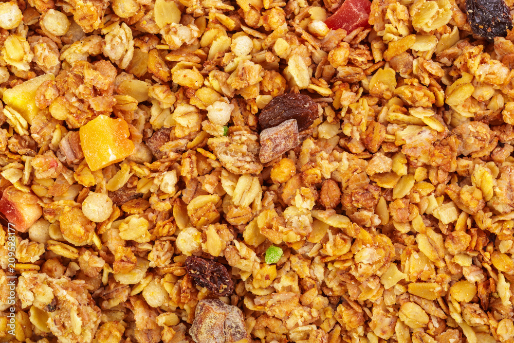 Homemade roasted granola on baking sheet breakfast food background Homemade roasted granola on baking sheet breakfast food background