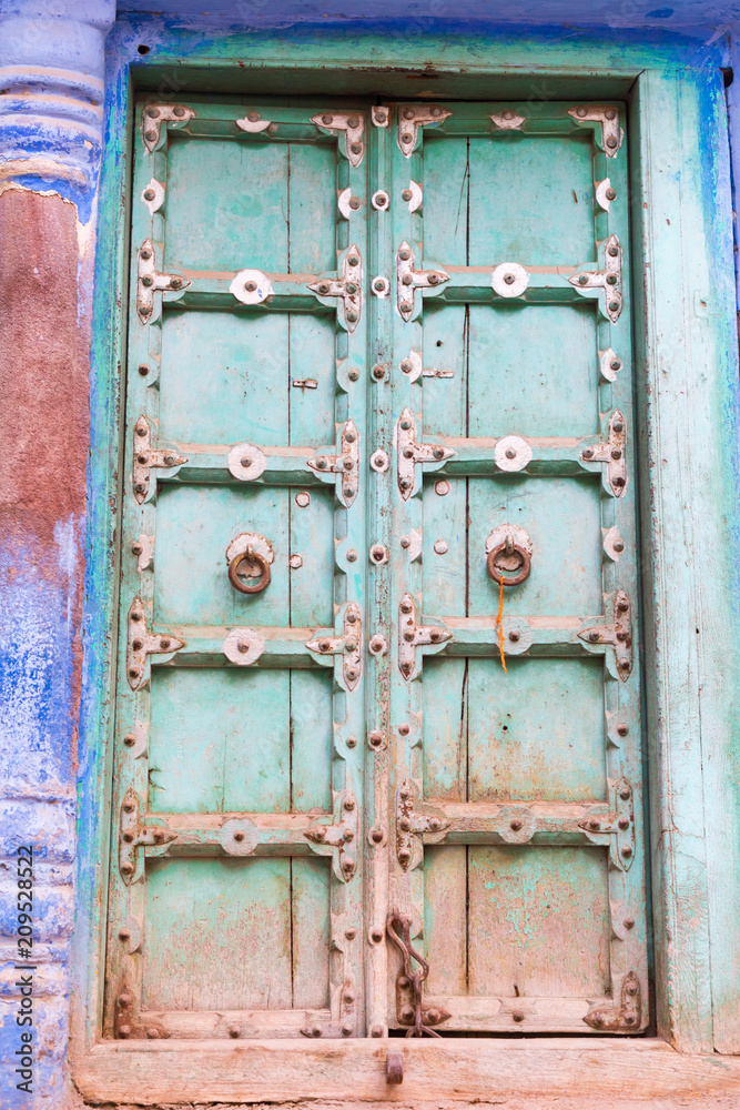 Naklejka premium Streets in the Jodhpur. Blue city. Abstract. Rajasthan, India. Blue houses, background. Bright blue streets and walls. Popular tourist city in India. Indian style.