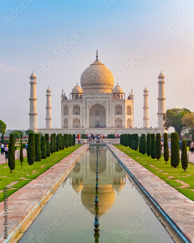 Canvas-taulu Taj Mahal front view reflected on the reflection pool, an ivory-white marble mausoleum on the south bank of the Yamuna river in Agra, Uttar Pradesh, India