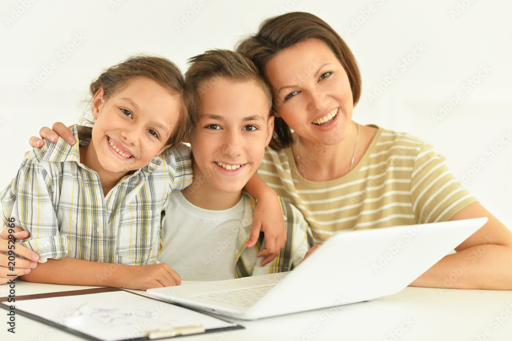 Close up portrait of smiling mother with children Close up portrait of smiling mother with children