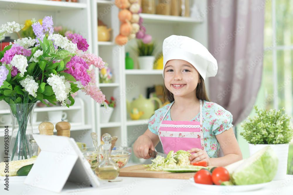 Cute girl preparing delicious fresh salad Cute girl preparing delicious fresh salad