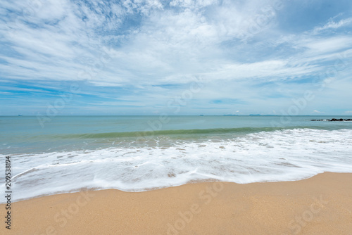 Soft waves on the sand beach © somchaichoosiri