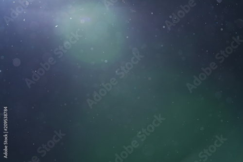 backlit real dust particles with lens flare