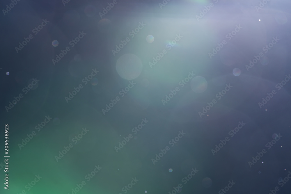 backlit real dust particles with lens flare backlit real dust particles with lens flare