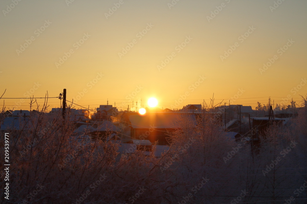 Winter sunrise in a small town. Russia, January, 2018.
