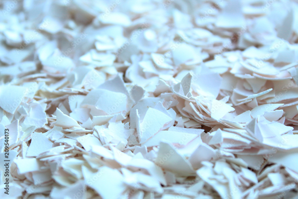 Broken egg shell of white color. Close-up. Background. Texture. Broken egg shell of white color. Close-up. Background. Texture.