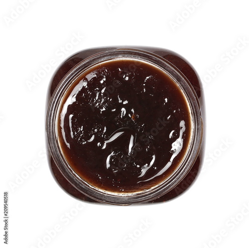 cherry jam in glass jar isolated on white, top view, clipping path