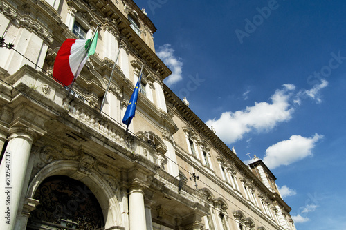 Italian and EU flags on a balcony of the italian army academy photo